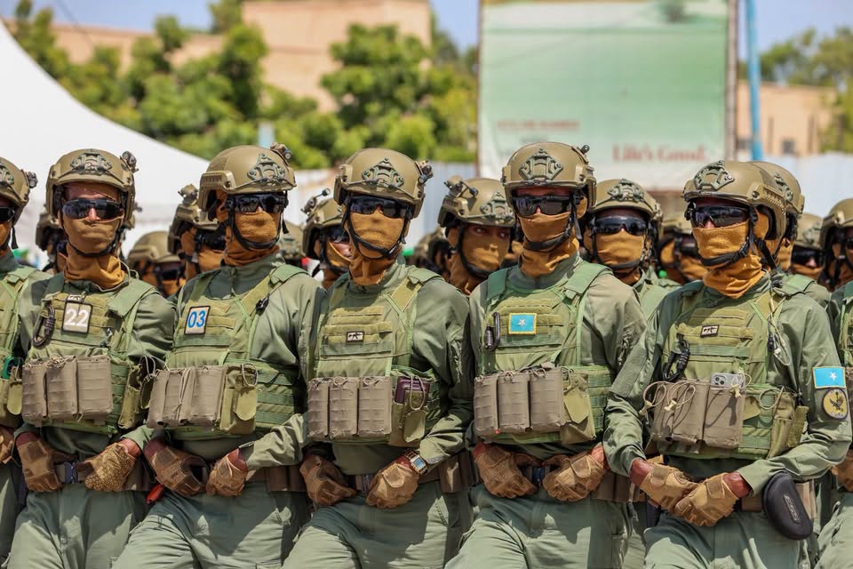 Somali National Army soldiers stand in formation during celebrations marking Somalia's July 1 Independence Day.