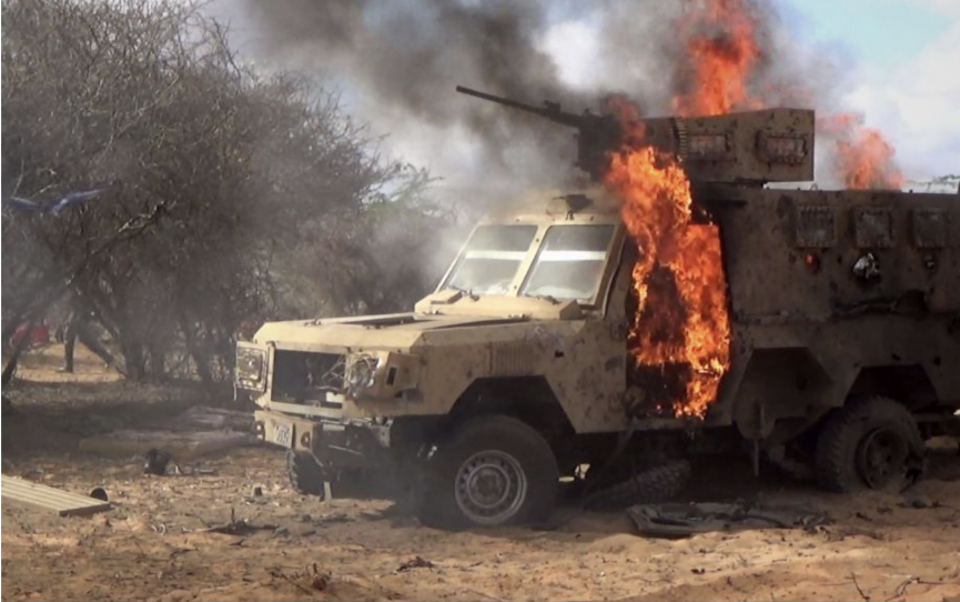 A military armoured vehicle seen burning after Al-Shabaab attack on Somali army base in Cows Weyne.