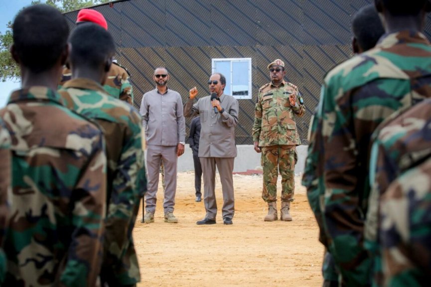 Minister of Defense Abduqadir Mohamed Noor (Jama) and President Hassan Sheikh Mohamud address newly trained security forces in Mogadishu on Friday 7 April 2023.