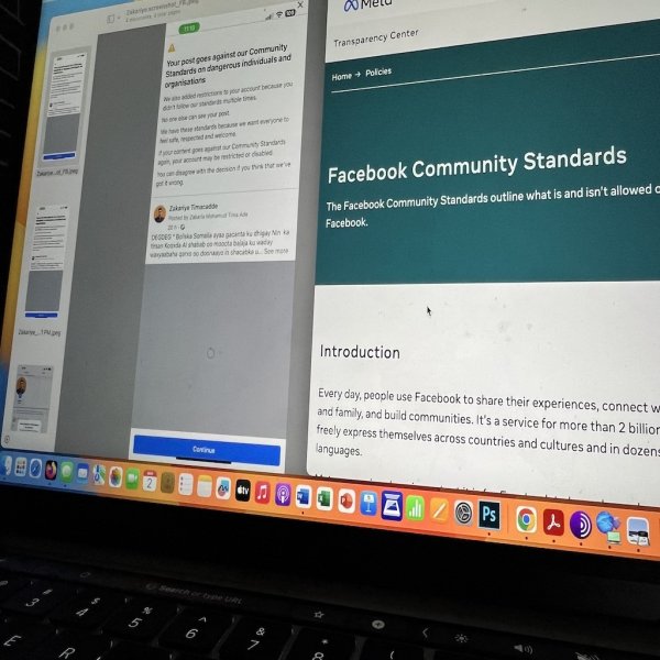 A photo shows Facebook’s Community Standards page alongside a screenshot of journalist Zakariye Timacadde whose Facebook page was restricted after posting interview critical to Somali authorities. | PHOTO Credit/SJS.
