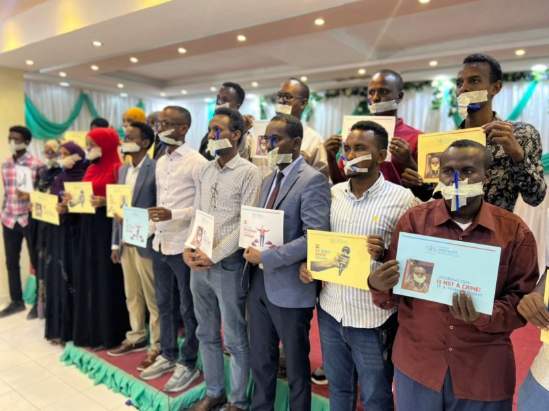 Amid encroaching threats from various directions, Somali journalists convene in a protest on December 5, 2022, within Mogadishu, rallying to voice their collective demand for freedom and security. | Photo/ SJS.